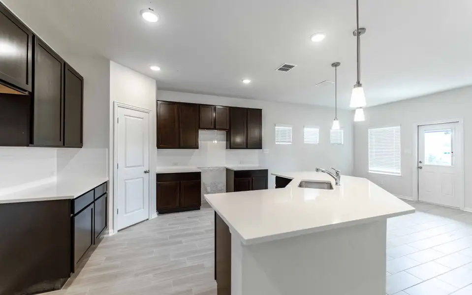 Furnished interior view inside a new home in Hunter's Ranch, San Antonio (Image 4).