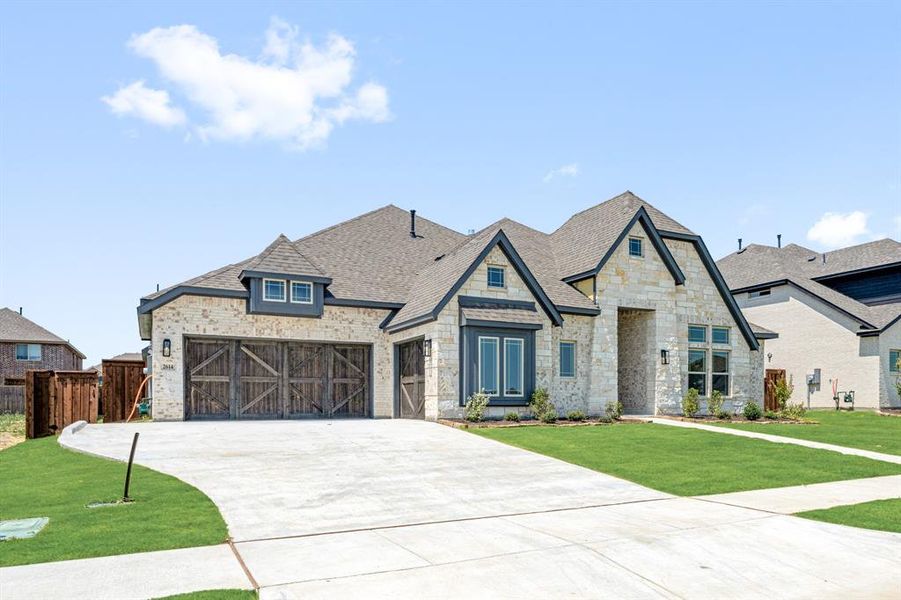 Front exterior of a new home in Somerset Classic 70s & 80s, Mansfield, TX, highlighting curb appeal (Image 20). Front exterior of a new home in Somerset Classic 70s & 80s, Mansfield, TX, highlighting curb appeal (Image 20).