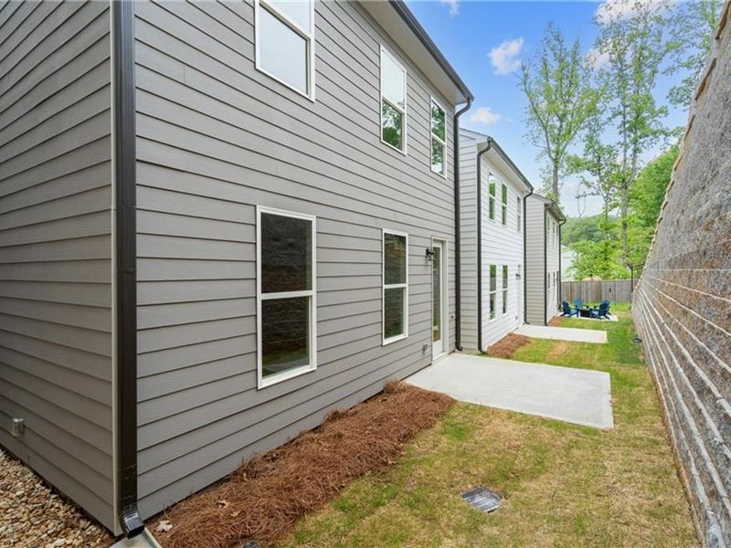Exterior details and patio area of a home in The Village at Shallowford, Kennesaw (Image 2).