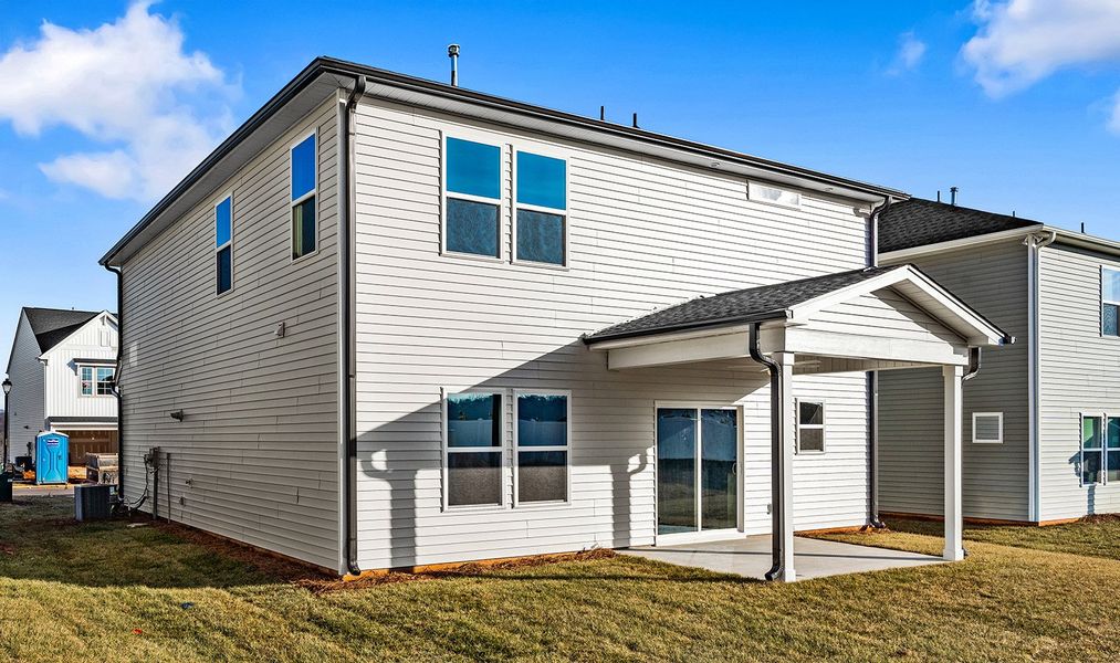 Exterior details and patio area of a home in Hanes Lake, Winston-Salem (Image 4).