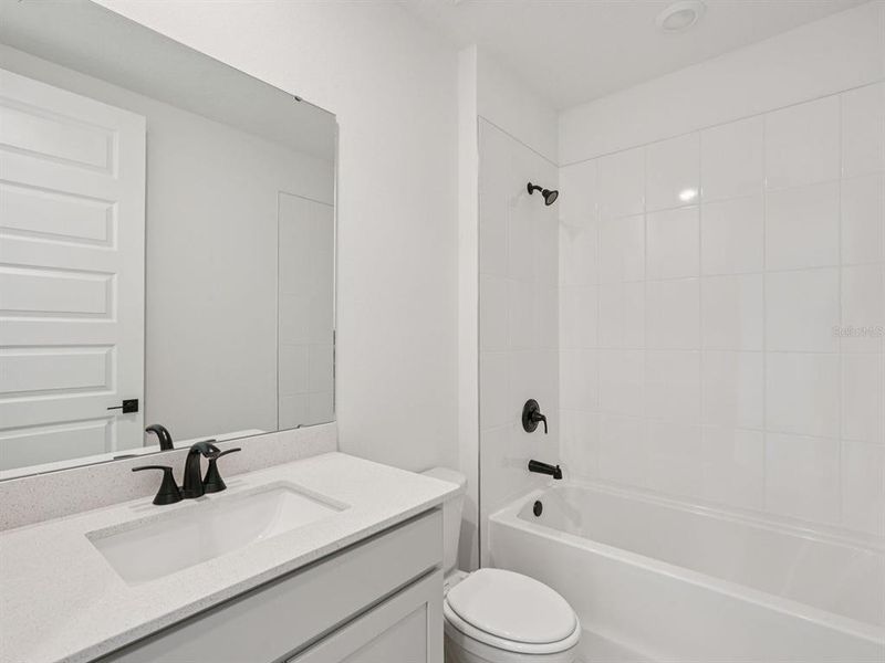 Furnished interior view inside a new home in Oakfield Trails - Signature Series, Parrish (Image 7). Furnished interior view inside a new home in Oakfield Trails - Signature Series, Parrish (Image 7).