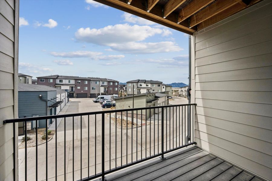 A view of a street from a balcony. A view of a street from a balcony.