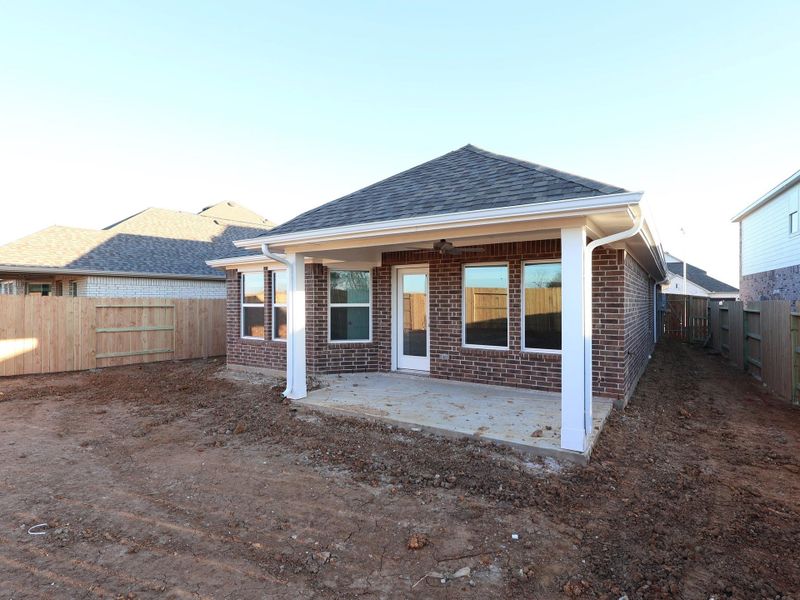 Exterior details and patio area of a home in Wildrye, Waller (Image 18).