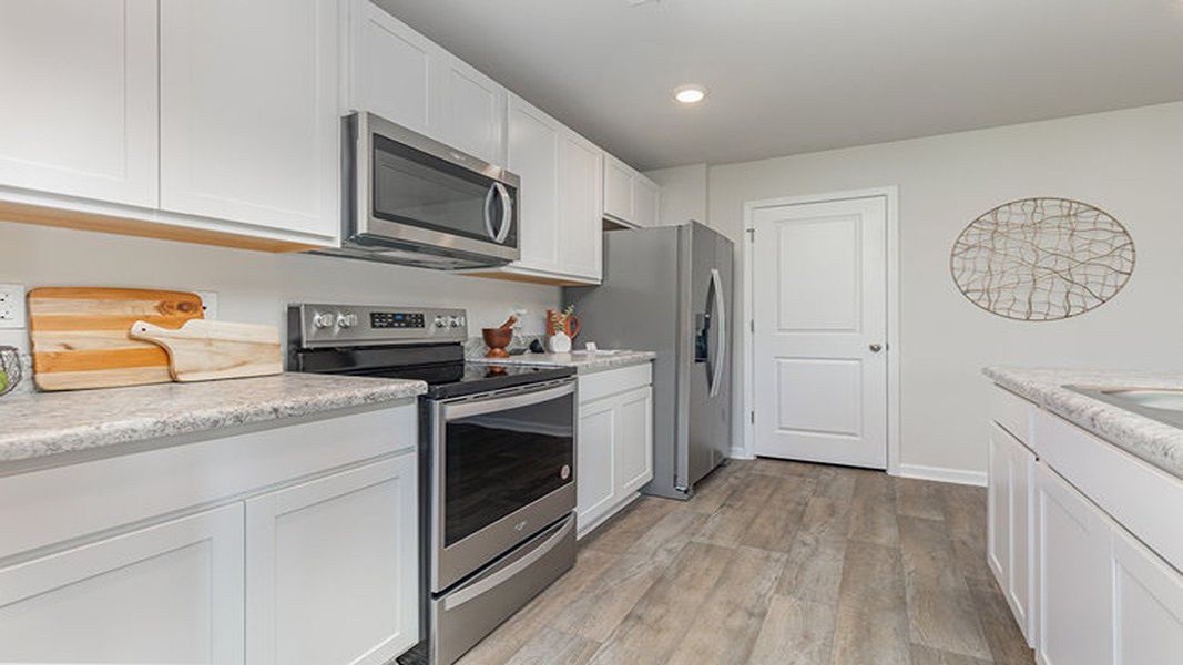 Furnished interior view inside a new home in Cottonwood Place, Tabor City (Image 3).