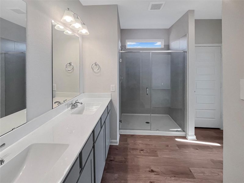 The Oriole II- Primary Bathroom with Walk-In Shower
