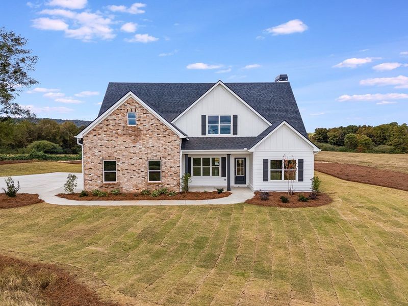 Front exterior of a new home in Parmer Farms, Roopville, GA, highlighting curb appeal (Image 1). Front exterior of a new home in Parmer Farms, Roopville, GA, highlighting curb appeal (Image 1).