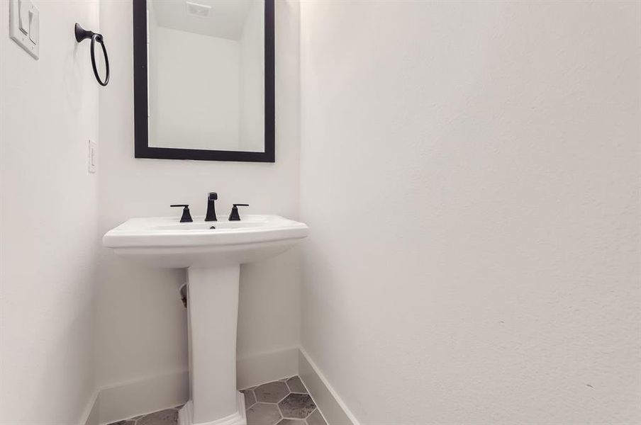 Bathroom featuring tile patterned floors