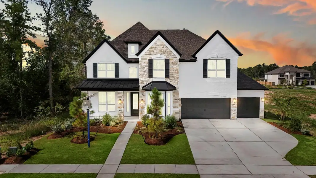 Front exterior of a new home in ARTAVIA, Conroe, TX, highlighting curb appeal (Image 1). Front exterior of a new home in ARTAVIA, Conroe, TX, highlighting curb appeal (Image 1).