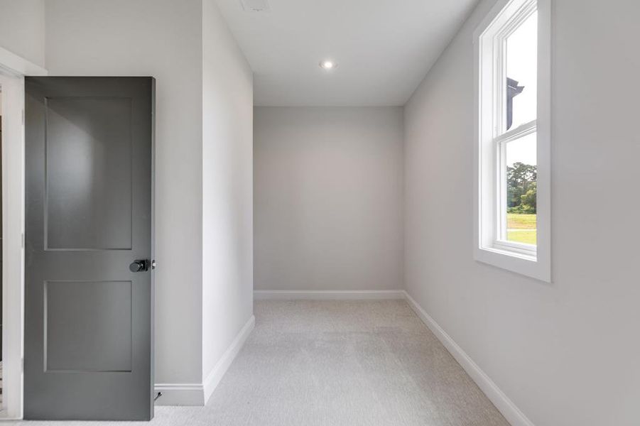 Spacious, unfurnished interior of a new home in Harmon Springs, Carrollton (Image 39).
