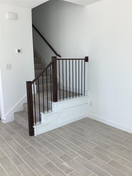 Stairs with wood-type flooring