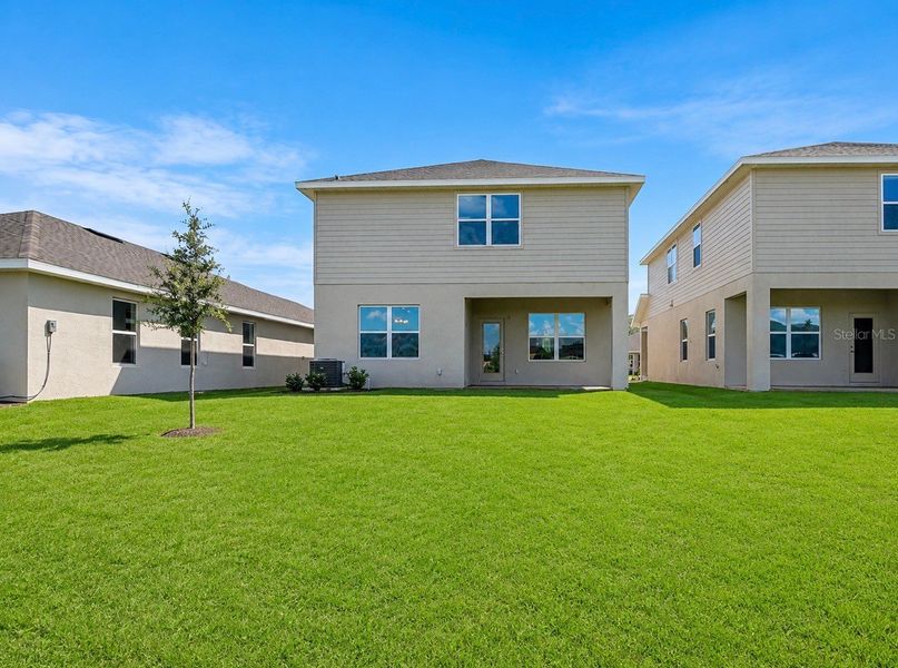 Exterior details and patio area of a home in Harmony Central, Harmony (Image 3).