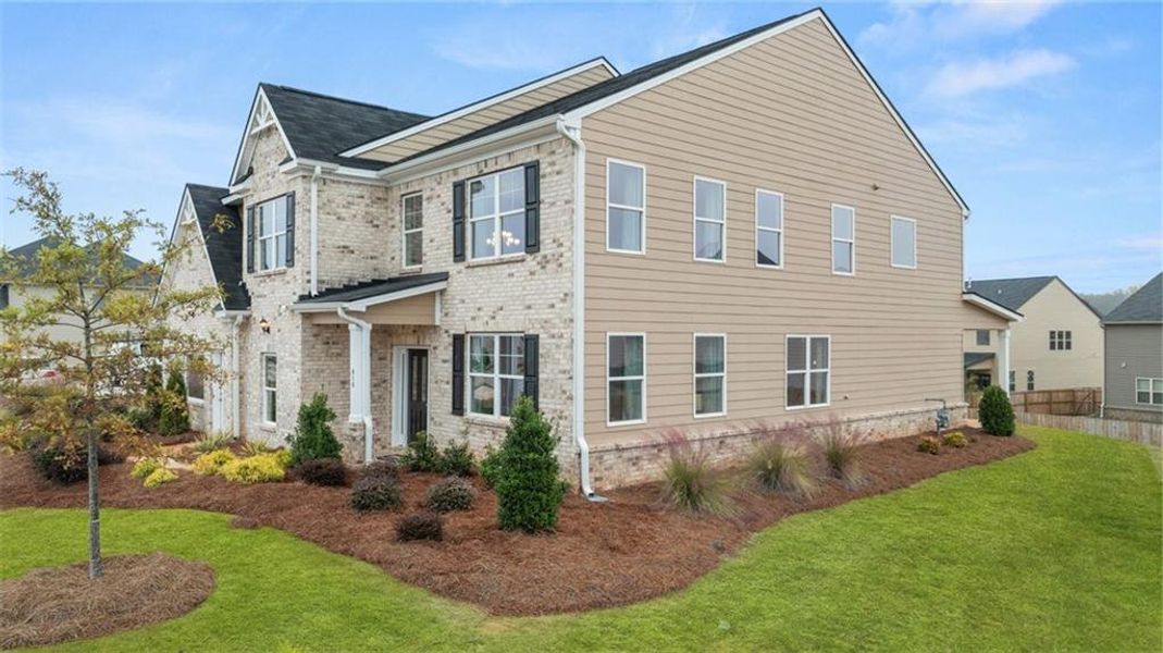 Exterior details and patio area of a home in The Gates at Pates Creek, Hampton (Image 3).
