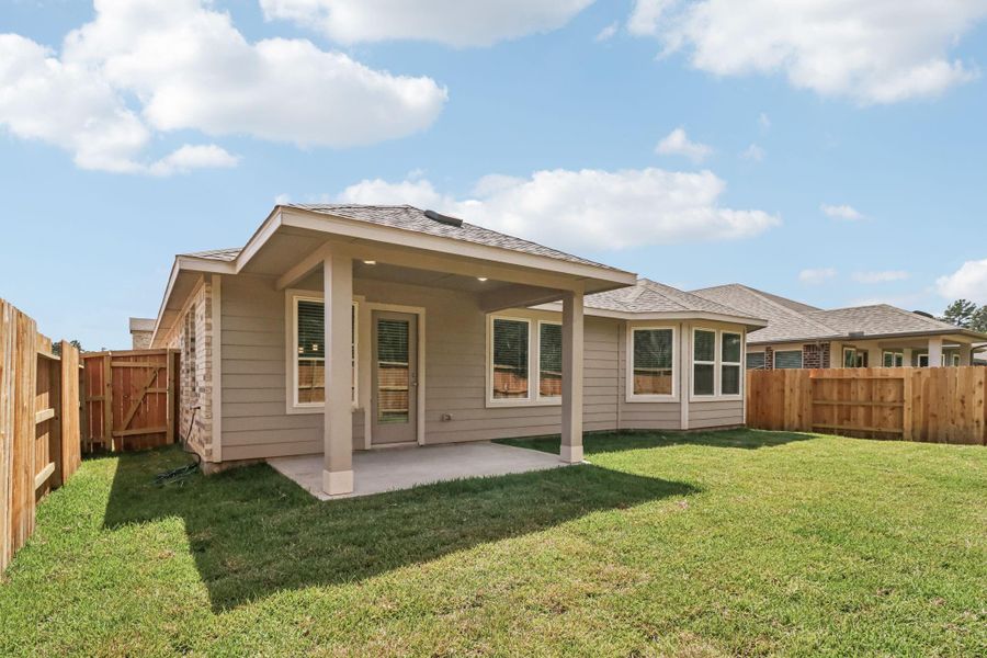Exterior details and patio area of a home in Stewart's Ranch, Conroe (Image 21). Exterior details and patio area of a home in Stewart's Ranch, Conroe (Image 21).