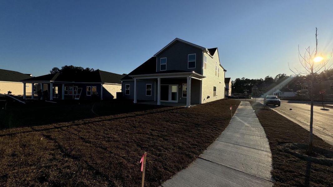 Front exterior of a new home in , Summerville, SC, highlighting curb appeal (Image 30). Front exterior of a new home in , Summerville, SC, highlighting curb appeal (Image 30).