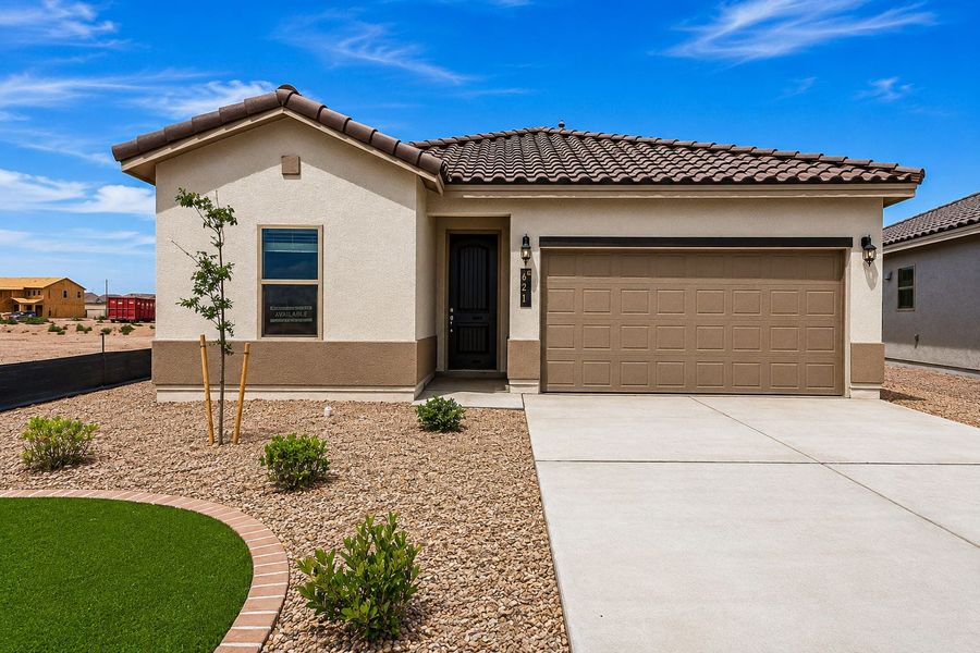 Front exterior of a new home in Paseos Del Este, Horizon City, TX, highlighting curb appeal (Image 26).