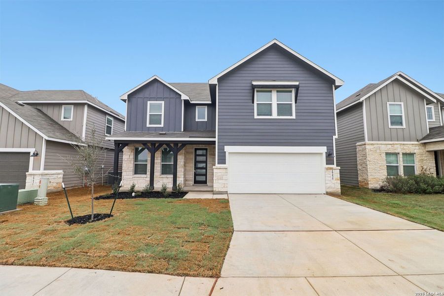 Front exterior of a new home in Estancia Ranch - Classic Series, San Antonio, TX, highlighting curb appeal (Image 28).