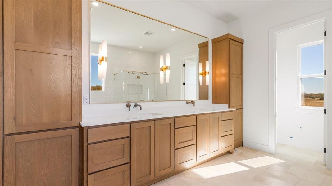 Bathroom with vanity and an enclosed shower