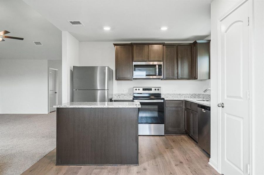Furnished interior view inside a new home in Retreat at Fossil Creek, Fort Worth (Image 3).