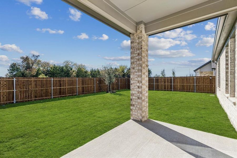 Covered Patio in the Winters home plan by Trophy Signature Homes – REPRESENTATIVE PHOTO Covered Patio in the Winters home plan by Trophy Signature Homes – REPRESENTATIVE PHOTO