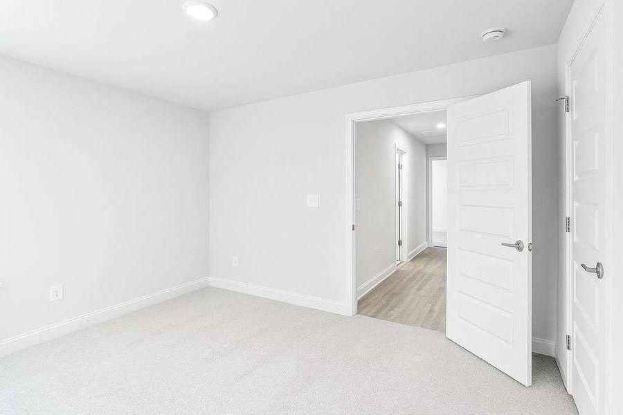 Spacious, unfurnished interior of a new home in Waters Edge, Mansfield (Image 26).