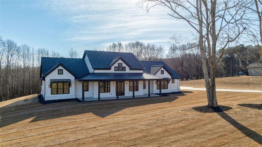 Front exterior of a new home in , Monroe, GA, highlighting curb appeal (Image 30).