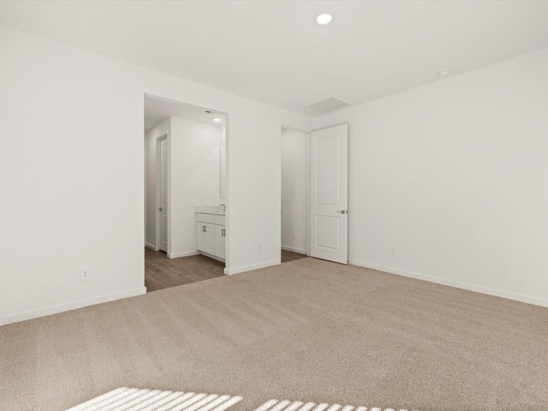 Spacious, unfurnished interior of a new home in Mountain View Estates Signature Series, Buckeye (Image 12).