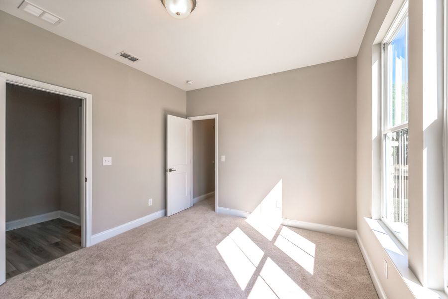 Representative unfurnished interior of a home built from the The Madison by UnionMain Homes in Pickens Bluff, Hiram (Image 16). Representative unfurnished interior of a home built from the The Madison by UnionMain Homes in Pickens Bluff, Hiram (Image 16).