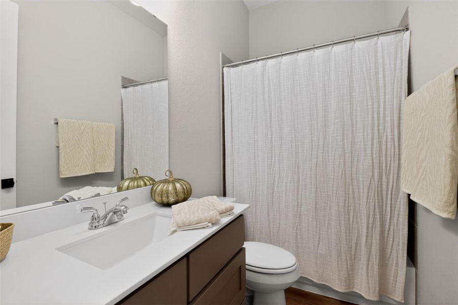 Furnished interior view inside a new home in Wolf Ranch, Georgetown (Image 28).