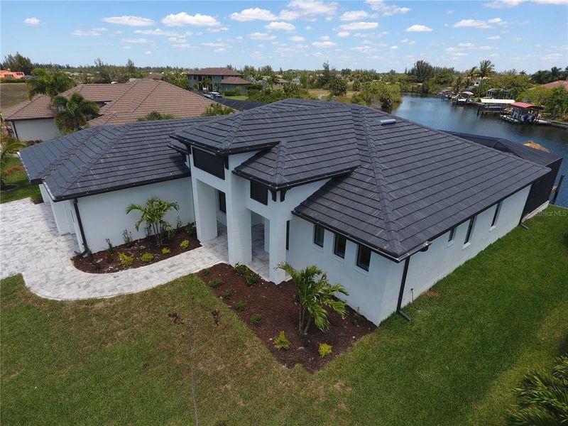 Front exterior of a new home in , Port Charlotte, FL, highlighting curb appeal (Image 22).
