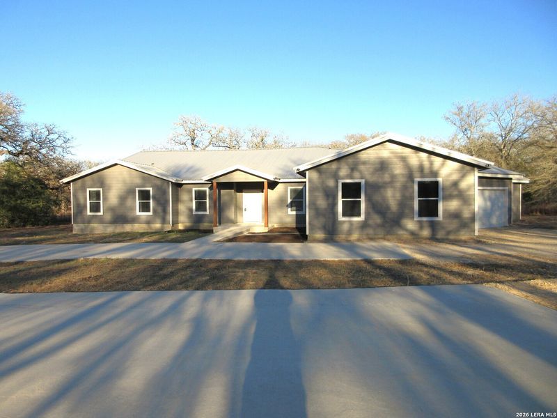 Front exterior of a new home in , Seguin, TX, highlighting curb appeal (Image 1). Front exterior of a new home in , Seguin, TX, highlighting curb appeal (Image 1).