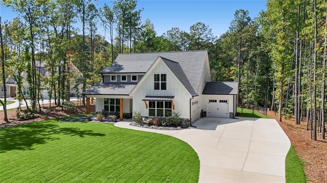 Front exterior of a new home in , Douglasville, GA, highlighting curb appeal (Image 28).