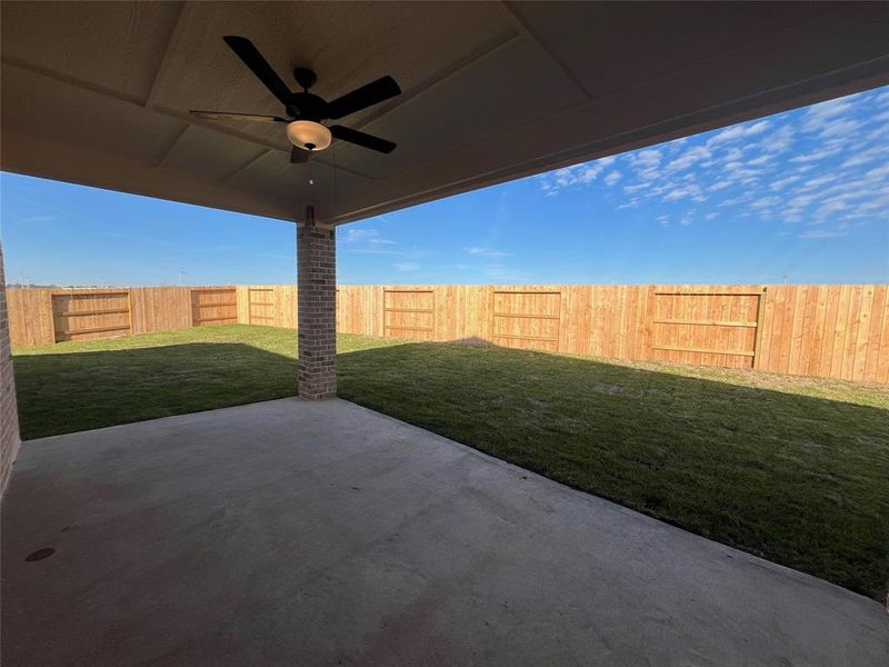 The spacious covered patio is perfect for outdoor entertaining.