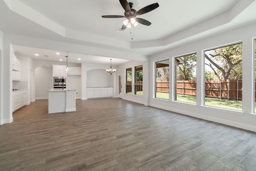 Family Room to Kitchen | Concept 2972 at Villages of Walnut Grove in Midlothian, TX by Landsea Homes