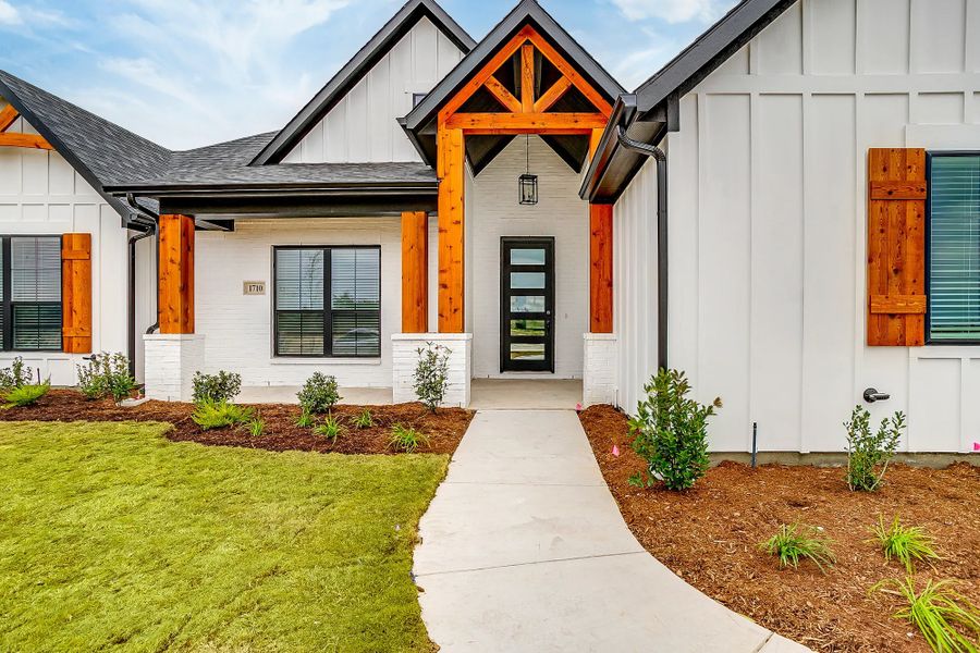 Representative exterior details of a home built from the The Magnolia by Elmwood Custom Homes in Matthews Farm, Venus (Image 6). Representative exterior details of a home built from the The Magnolia by Elmwood Custom Homes in Matthews Farm, Venus (Image 6).