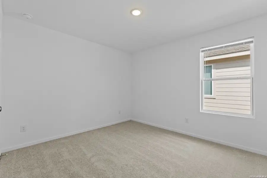 Spacious, unfurnished interior of a new home in Hidden Oasis, San Antonio (Image 24).