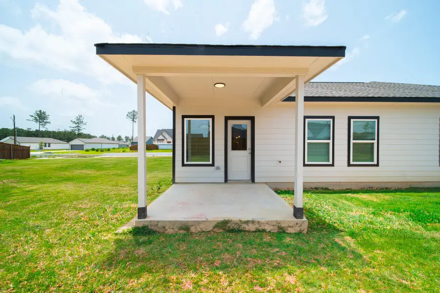 Exterior details and patio area of a home in , Conroe (Image 3). Exterior details and patio area of a home in , Conroe (Image 3).