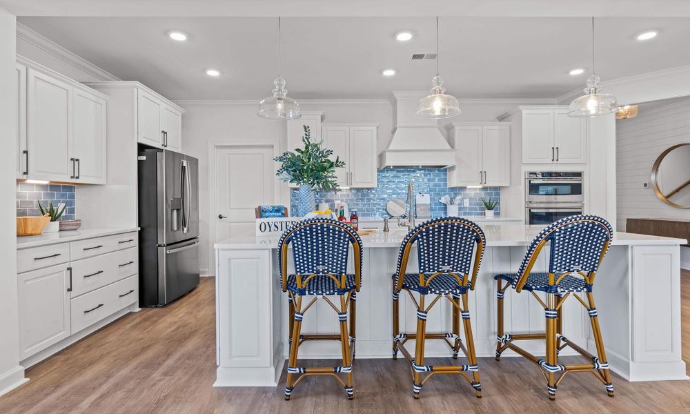 Representative furnished interior of a home built from the The Longboard by Chesapeake Homes in Bridgewater - Shorehaven Village, Little River (Image 10).