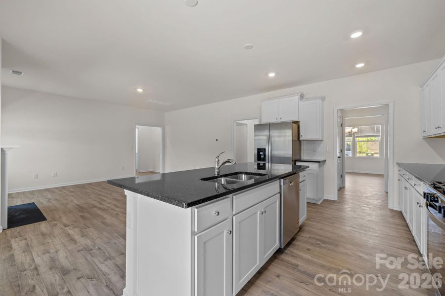 Furnished interior view inside a new home in McFarland Estates, York (Image 12).