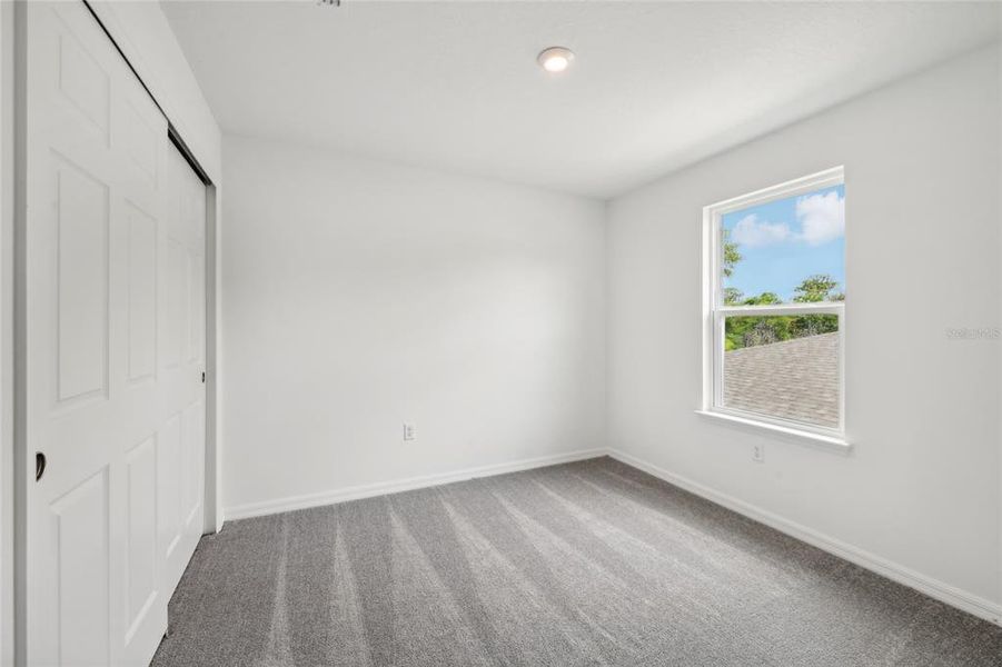 Spacious, unfurnished interior of a new home in Brack Ranch, St. Cloud (Image 23).