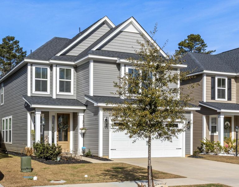 Front exterior of a new home in Windsor Crossing, North Charleston, SC, highlighting curb appeal (Image 23).