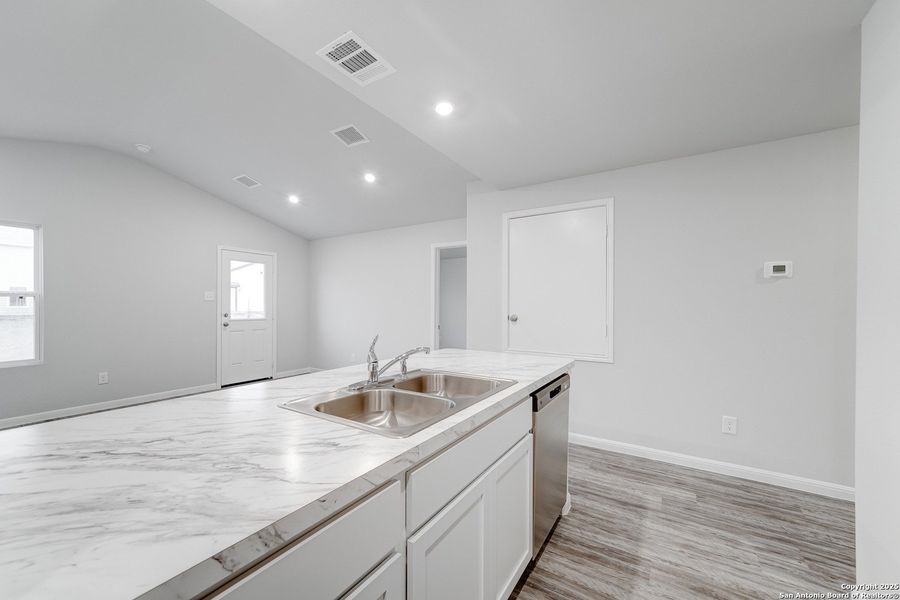 Furnished interior view inside a new home in Las Colinas, Kenedy (Image 8).