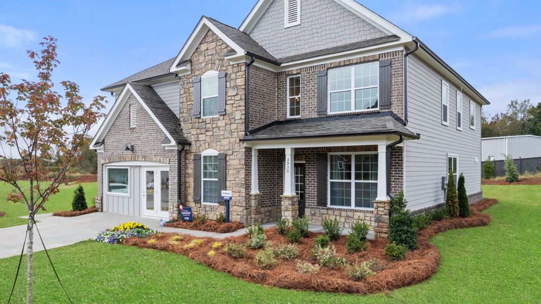 Representative exterior photo of a completed home built from the GRAYSON by D.R. Horton in Haven Abbey, Cumming, GA (Image 22).