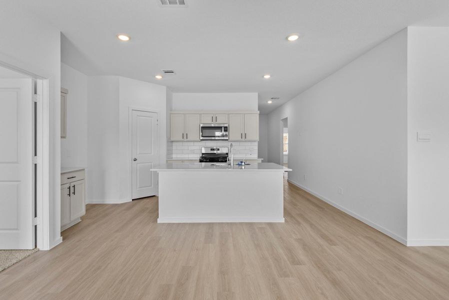 Furnished interior view inside a new home in Harrington Trails at The Canopies, Splendora (Image 7).