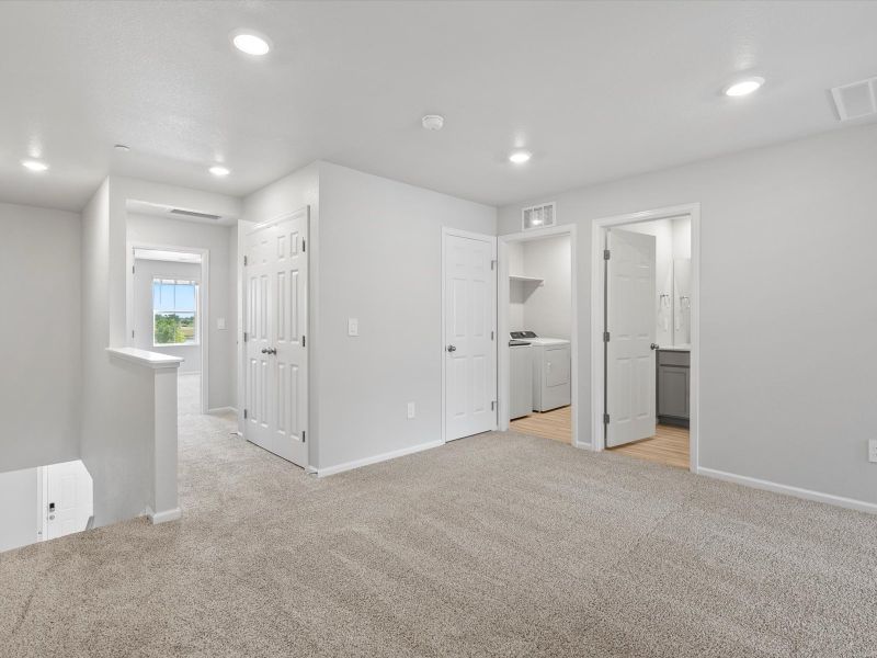 Spacious, unfurnished interior of a new home in Poudre Heights: The Meadow Collection, Windsor (Image 11).