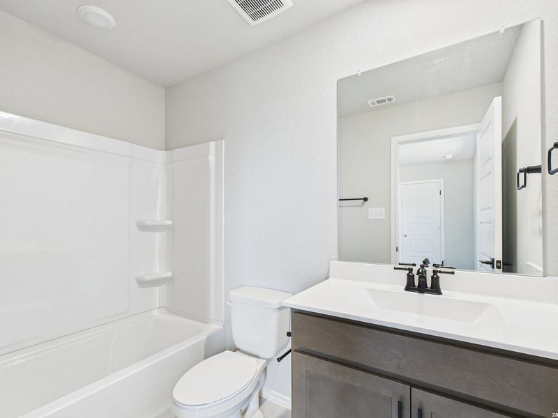 Furnished interior view inside a new home in Bricewood, San Antonio (Image 39).