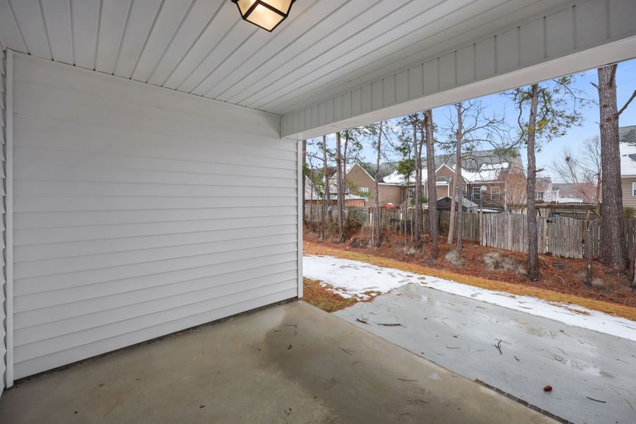 Exterior details and patio area of a home in Davenport Farms, Winterville (Image 29).