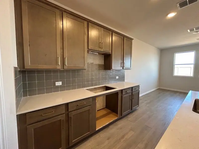 Furnished interior view inside a new home in Willow Springs, Buda (Image 6).
