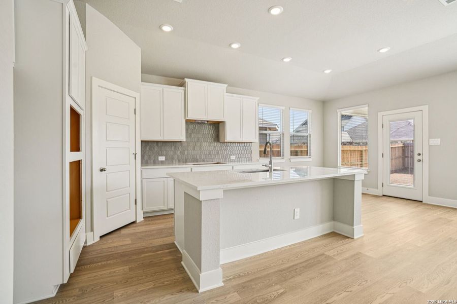 Furnished interior view inside a new home in Estancia Ranch - Classic Series, San Antonio (Image 13).