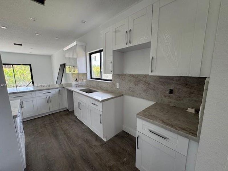 Furnished interior view inside a new home in , Miami Gardens (Image 4).