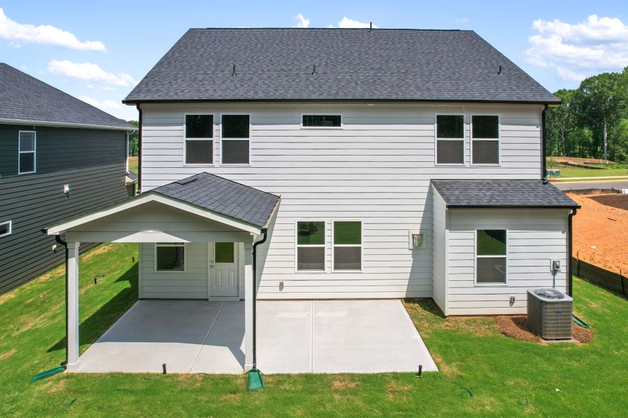 Exterior details and patio area of a home in Michaux Gardens, Belmont (Image 4).